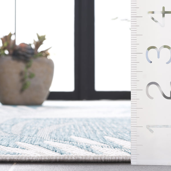 Safavieh Beach House Elegant Indoor/Outdoor Area Rug - Stylish, Durable, And Perfect For Coastal Living Spaces Aqua ,Ivory 85% Polypropylene,15% Polyester Bhs264j-7r