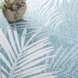 Safavieh Beach House Elegant Indoor/Outdoor Area Rug - Stylish, Durable, And Perfect For Coastal Living Spaces Aqua ,Ivory 85% Polypropylene,15% Polyester Bhs264j-7r