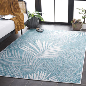 Safavieh Beach House Elegant Indoor/Outdoor Area Rug - Stylish, Durable, And Perfect For Coastal Living Spaces Aqua ,Ivory 85% Polypropylene,15% Polyester Bhs264j-7r