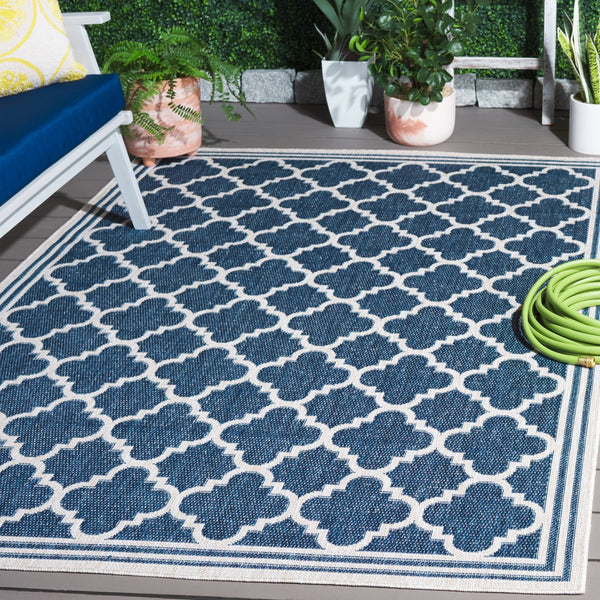 Safavieh Beach House Stylish Area Rug For Modern Decor, Durable Polypropylene & Polyester Blend, Large Size Blue ,Ivory 85% Polypropylene,15% Polyester Bhs266m-7sq