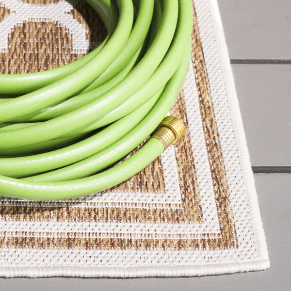 Safavieh Beach House Stylish Area Rug For Modern Decor, Durable Polypropylene & Polyester Blend, Large Size Brown ,Ivory 85% Polypropylene,15% Polyester Bhs266t-26