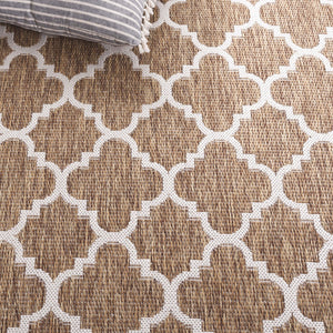 Safavieh Beach House Stylish Area Rug For Modern Decor, Durable Polypropylene & Polyester Blend, Large Size Brown ,Ivory 85% Polypropylene,15% Polyester Bhs266t-26