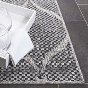 Safavieh Beach House Modern Area Rug - Elegant Charcoal And Grey Design For Indoor & Outdoor Spaces Charcoal ,Grey 85% Polypropylene,15% Polyester Bhs280h-5