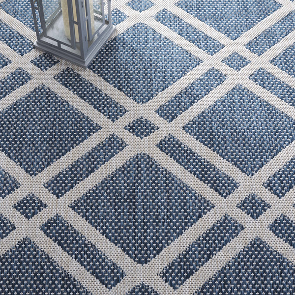 Safavieh Beach Power Loomed Area Rug - Modern Blue And Ivory Design For Indoor And Outdoor Elegance Blue ,Ivory 85% Polypropylene,15% Polyester Bhs282m-8