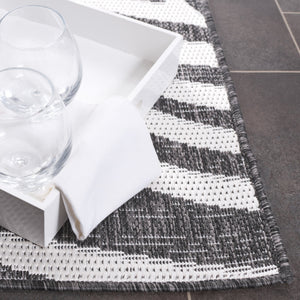 Safavieh Beach Modern Elegance Area Rug – Stylish Charcoal & Ivory Design For Indoor/Outdoor Spaces Charcoal ,Ivory 85% Polypropylene,15% Polyester Bhs294h-7r