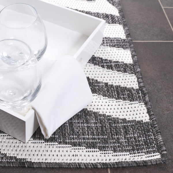 Safavieh Beach Modern Elegance Area Rug – Stylish Charcoal & Ivory Design For Indoor/Outdoor Spaces Charcoal ,Ivory 85% Polypropylene,15% Polyester Bhs294h-7r