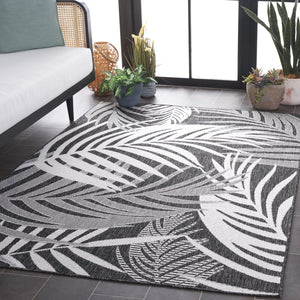 Safavieh Beach Modern Elegance Area Rug – Stylish Charcoal & Ivory Design For Indoor/Outdoor Spaces Charcoal ,Ivory 85% Polypropylene,15% Polyester Bhs294h-7r