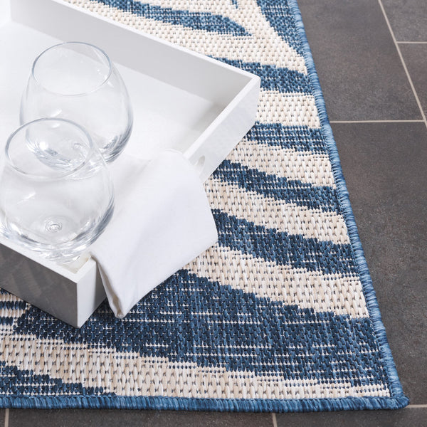 Safavieh Beach Modern Elegance Area Rug – Stylish Charcoal & Ivory Design For Indoor/Outdoor Spaces Blue ,Ivory 85% Polypropylene,15% Polyester Bhs294m-8