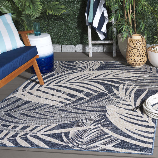 Safavieh Beach Modern Elegance Area Rug – Stylish Charcoal & Ivory Design For Indoor/Outdoor Spaces Blue ,Ivory 85% Polypropylene,15% Polyester Bhs294m-8