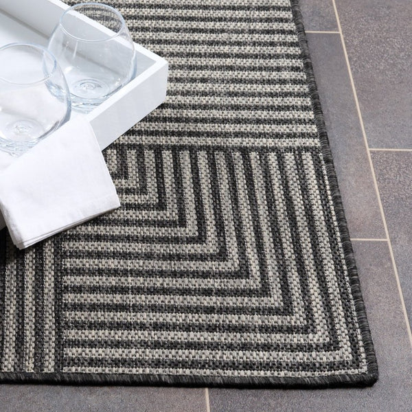 Safavieh Beach House Power Loomed Polypropylene Area Rug in Sleek Black Grey for Living Rooms BHS300Z-9