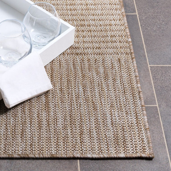 Safavieh Beach House Solid Beige Power Loomed Polypropylene Low Pile Living Room Area Rug BHS302B-9