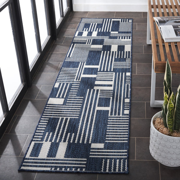 Safavieh Beach House Elegant Geometric Area Rug In Navy And Ivory For Indoor And Outdoor Spaces 5' X 7'6" Navy ,Ivory Polypropylene Bhs402n-7sq