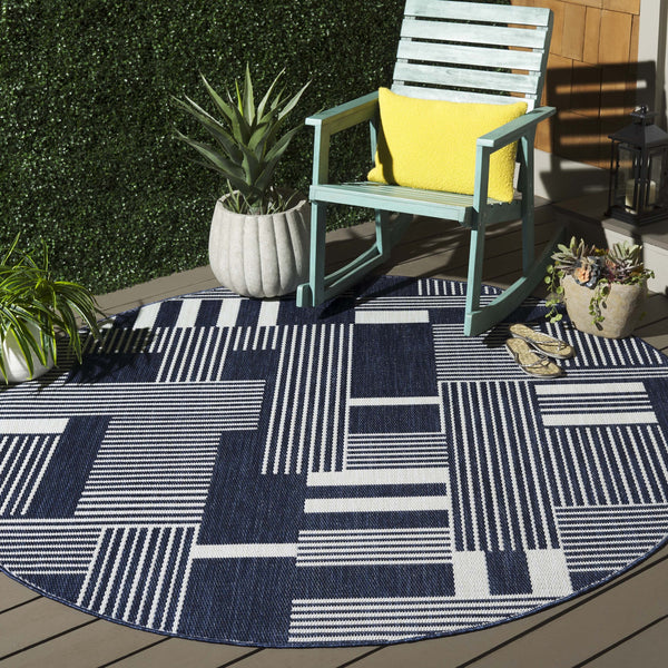 Safavieh Beach House Elegant Geometric Area Rug In Navy And Ivory For Indoor And Outdoor Spaces 5' X 7'6" Navy ,Ivory Polypropylene Bhs402n-7sq