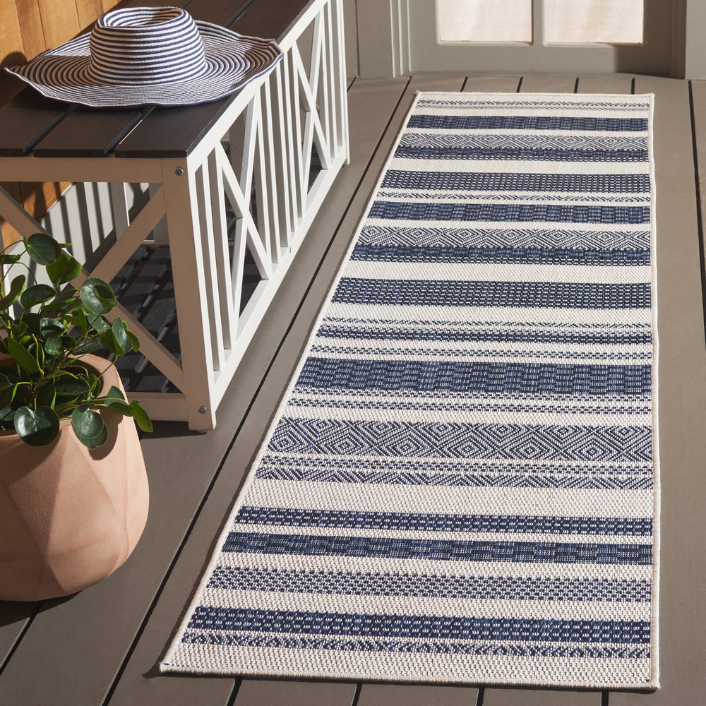 Safavieh Beach Area Rug - Elegant Power-loomed Design In Navy And Ivory For Stylish Indoor & Outdoor Spaces Brown ,Ivory Polypropylene Bhs410t-7sq