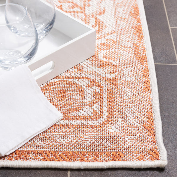 Safavieh Bermuda Elegant Polypropylene Frize Area Rug - Timeless Design For Indoor/Outdoor Spaces, Oeko-tex Certified Rust ,Ivory Polypropylene Frize Bmu841p-5