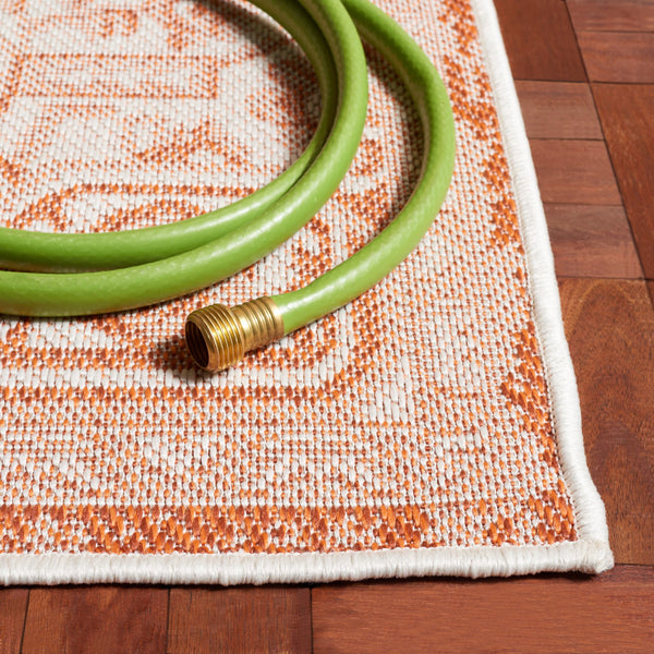 Safavieh Bermuda Elegant Polypropylene Frize Area Rug - Timeless Design For Indoor/Outdoor Spaces, Oeko-tex Certified Rust ,Ivory Polypropylene Frize Bmu841p-5