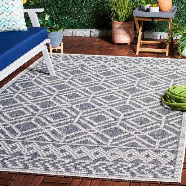 Safavieh Bermuda Elegant Area Rug For Indoor & Outdoor Spaces, Durable Design With Classic Geometric Patterns Navy ,Ivory Polypropylene Frize Bmu874n-9
