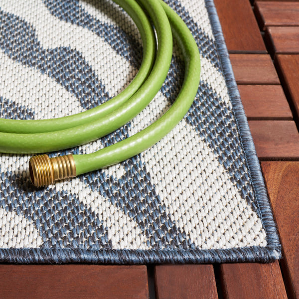 Safavieh Bermuda Area Rug – Elegant Zebra Pattern, Durable Power Loomed Design For Indoor & Outdoor Spaces Navy ,Ivory Polypropylene Frize Bmu881n-7sq