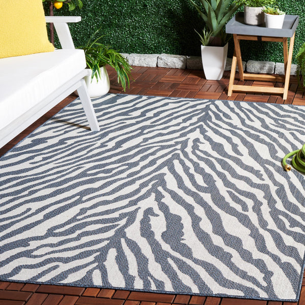 Safavieh Bermuda Area Rug – Elegant Zebra Pattern, Durable Power Loomed Design For Indoor & Outdoor Spaces Navy ,Ivory Polypropylene Frize Bmu881n-7sq