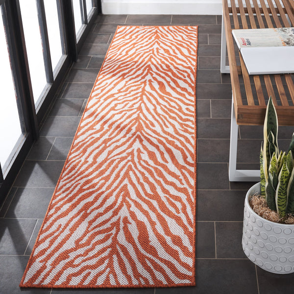 Safavieh Bermuda Area Rug – Elegant Zebra Pattern, Durable Power Loomed Design For Indoor & Outdoor Spaces Rust ,Ivory Polypropylene Frize Bmu881p-4
