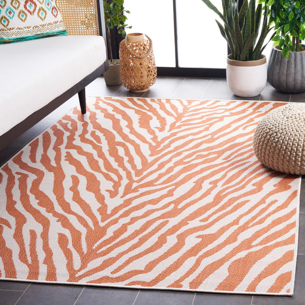 Safavieh Bermuda Area Rug – Elegant Zebra Pattern, Durable Power Loomed Design For Indoor & Outdoor Spaces Rust ,Ivory Polypropylene Frize Bmu881p-4