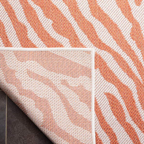 Safavieh Bermuda Area Rug – Elegant Zebra Pattern, Durable Power Loomed Design For Indoor & Outdoor Spaces Rust ,Ivory Polypropylene Frize Bmu881p-4