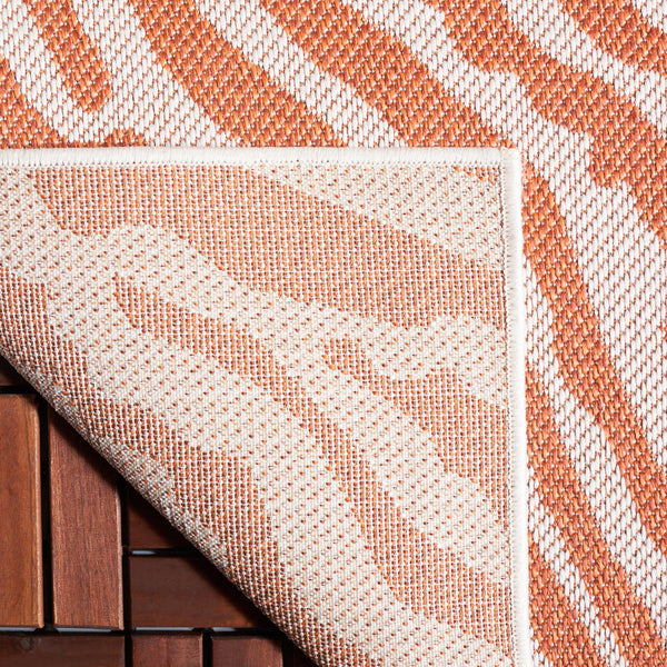 Safavieh Bermuda Area Rug – Elegant Zebra Pattern, Durable Power Loomed Design For Indoor & Outdoor Spaces Rust ,Ivory Polypropylene Frize Bmu881p-4