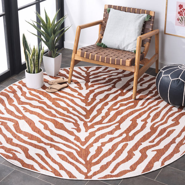 Safavieh Bermuda Area Rug – Elegant Zebra Pattern, Durable Power Loomed Design For Indoor & Outdoor Spaces Rust ,Ivory Polypropylene Frize Bmu881p-4