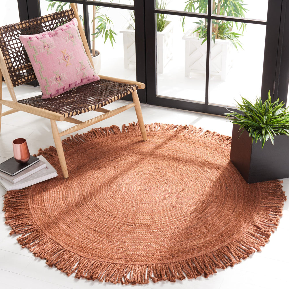 Safavieh Braided Rustic Jute Round Rug In Rust With Fringe — Handwoven Boho Texture, Eco-Friendly Charm 7'-0" x 7'-0" BRD259P-7R