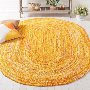 Safavieh Braided Handwoven Oval Area Rug In Warm Gold Cotton — Bohemian-Modern Texture, Low-Profile Elegance 7'-0" x 9'-0" BRD452D-79OV
