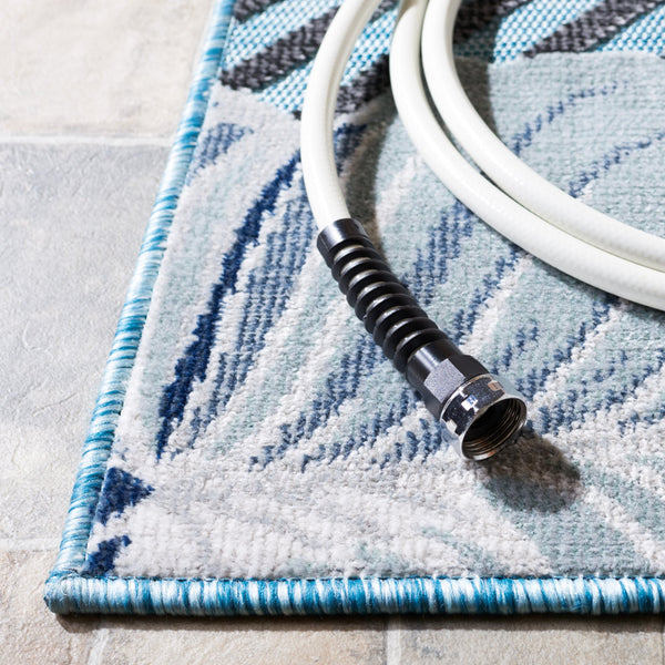 Safavieh Cabana Exquisite Tropical Motif Area Rug - Stylish, Durable, And Versatile For Indoor/Outdoor Spaces Aqua ,Navy 88% Polypropylene,12% Polyester Cbn447k-210