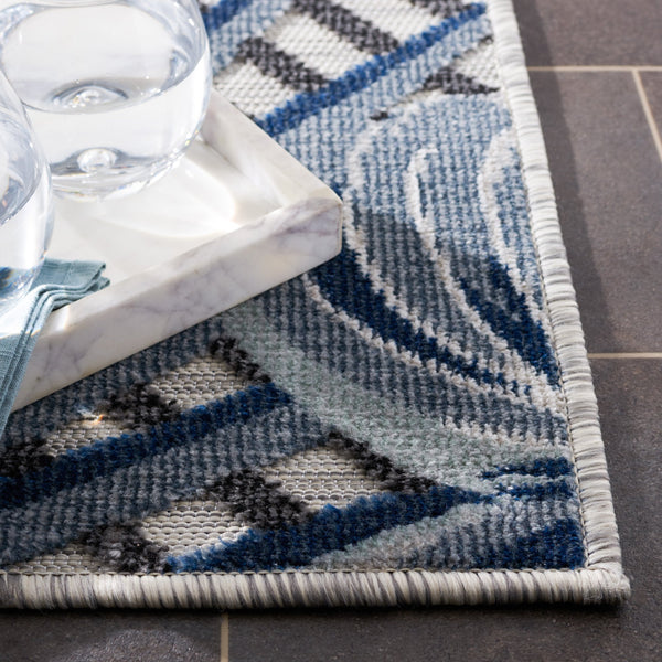 Safavieh Cabana Exquisite Tropical Motif Area Rug - Stylish, Durable, And Versatile For Indoor/Outdoor Spaces Ivory ,Navy 88% Polypropylene,12% Polyester Cbn447n-210