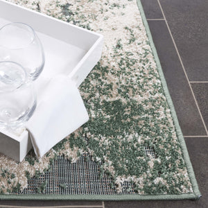 Safavieh Cabana Modern Power Loomed Area Rug From Turkey - Chic Green And Ivory Design For Elegant Spaces Green ,Ivory Polypropylene Cbn630y-9