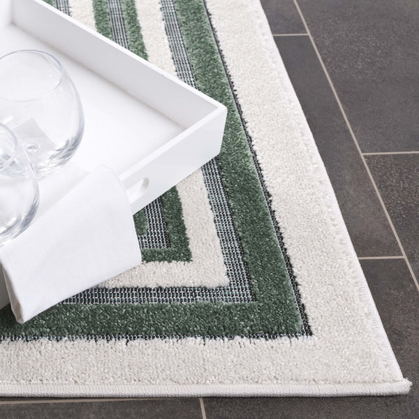 Safavieh Cabana Elegant Ivory And Green Area Rug - Durable, Stylish, And Oeko-tex Certified For Your Home Ivory ,Green Polypropylene Cbn634a-5