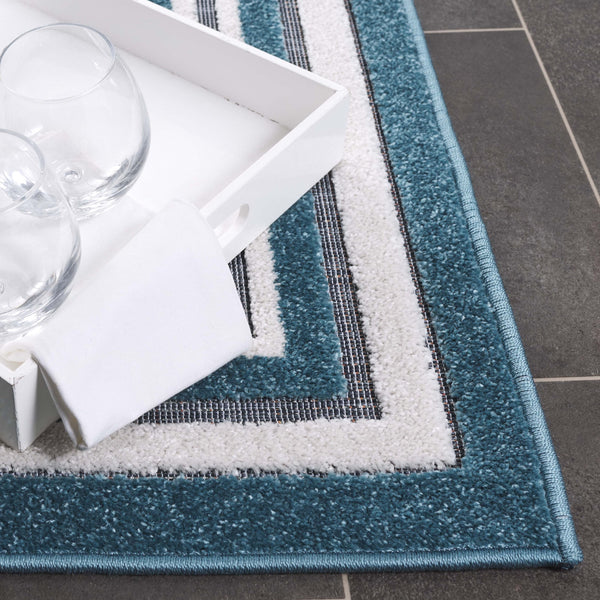 Safavieh Cabana Elegant Ivory And Green Area Rug - Durable, Stylish, And Oeko-tex Certified For Your Home Turquoise ,Ivory Polypropylene Cbn634k-7r