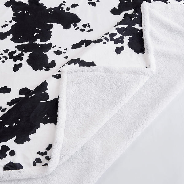 Hiend Accents Elsa Cowhide Campfire Sherpa Throw - Luxurious Warmth For Cozy Nights & Stylish Home Décor Black,White Front, 100% Polyester,Back, 100% Polyester (Sherpa Fabric) Cf3067th-os-bk