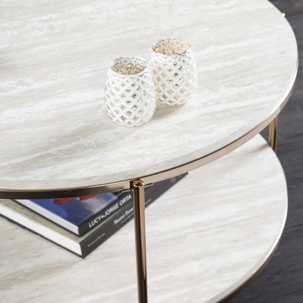 Safavieh Silas Round Cocktail Table With Faux Travertine Top And Glam Metal Frame For Living Rooms CHAMPAGNE CK5730