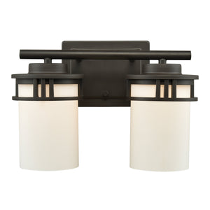 Thomas Lighting Ravendale Two Light Vanity Fixture with Cylindrical Glass Shades for Modern Bathrooms Bronze 12'' Wide 2-Light Vanity Light CN578211