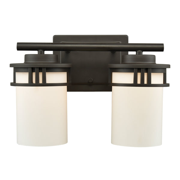 Thomas Lighting Ravendale Two Light Vanity Fixture with Cylindrical Glass Shades for Modern Bathrooms Bronze 12'' Wide 2-Light Vanity Light CN578211