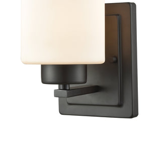 Thomas Lighting Summit Place Transitional Wall Sconce Brushed Metal with Cylindrical Glass Shade Bronze CN579171