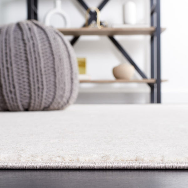 Safavieh Continental 104 Power Loomed Solid & Tonal Rug Ivory / Beige CON104A-5