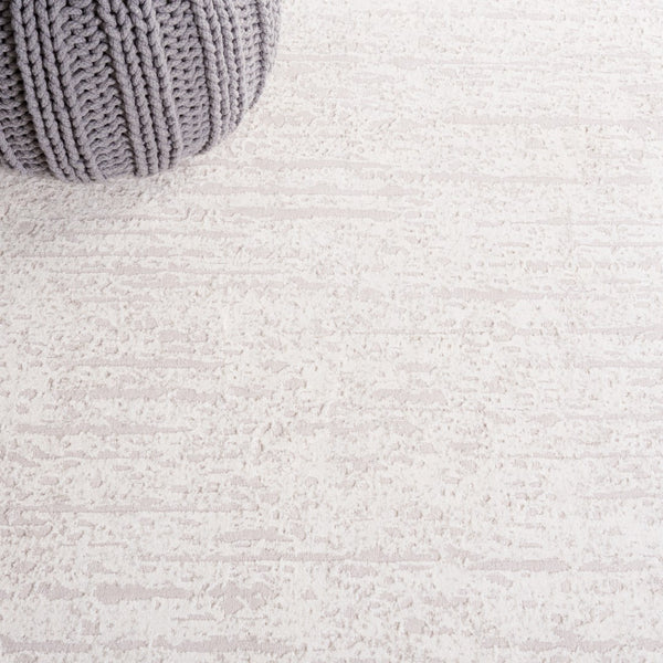 Safavieh Continental 104 Power Loomed Solid & Tonal Rug Ivory / Beige CON104A-5