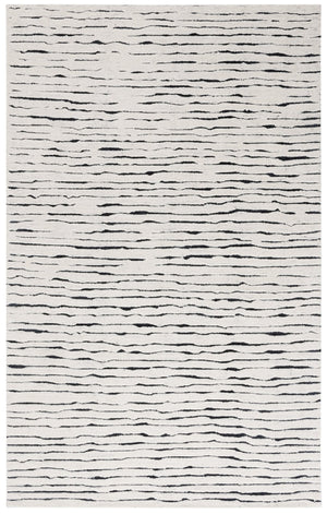 Safavieh Casablanca Hand-tufted Wool Area Rug - Elegant Ivory And Black Design For Timeless Home Decor Ivory ,Black Wool Pile Csb227a-5