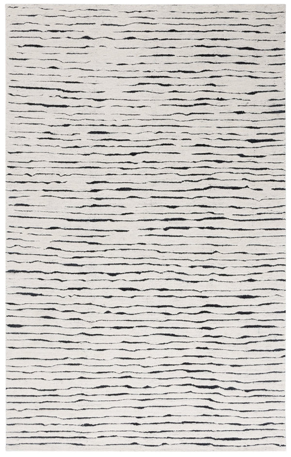 Safavieh Casablanca Hand-tufted Wool Area Rug - Elegant Ivory And Black Design For Timeless Home Decor Ivory ,Black Wool Pile Csb227a-5