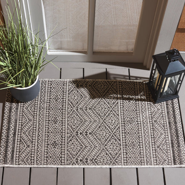 Safavieh Courtyard Power Loomed Indoor/Outdoor Rug – Modern Geometric Design For Stylish Decor Solutions Black ,Grey 85.4% Polypropylene,10.4% Polyester,4.2% Latex Cy8168-37621-27