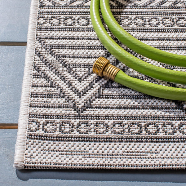 Safavieh Courtyard Indoor/Outdoor Area Rug - Elegant Geometric Design In Beige And Green For Any Space Grey ,Brown 85.4% Polypropylene,10.4% Polyester,4.2% Latex Cy8196-36312-9