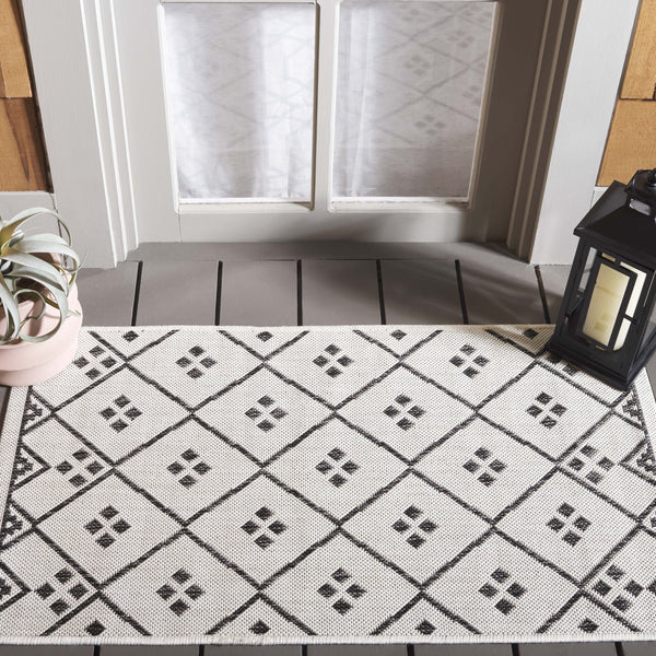 Safavieh Courtyard Elegant Geometric Pattern Area Rug For Modern Homes - Versatile Indoor/Outdoor Decor Ivory ,Black 88% Polypropylene,12% Polyester Cy8303-536-7r