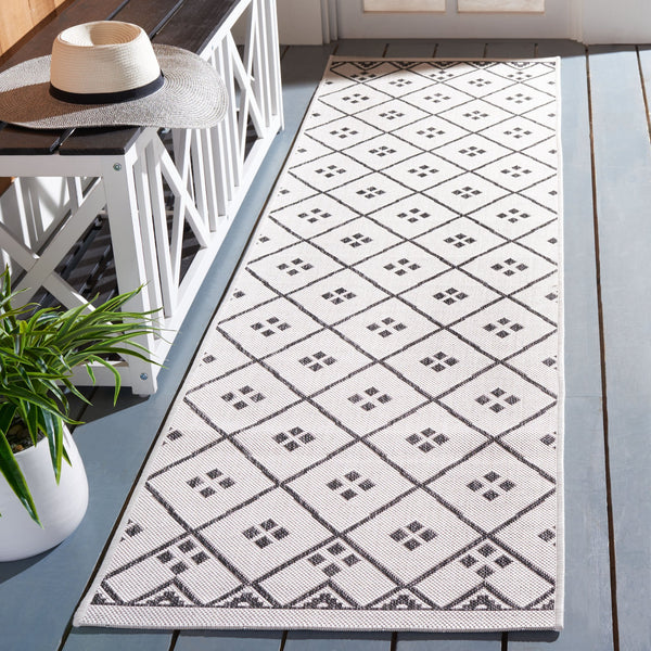 Safavieh Courtyard Elegant Geometric Pattern Area Rug For Modern Homes - Versatile Indoor/Outdoor Decor Ivory ,Black 88% Polypropylene,12% Polyester Cy8303-536-7r
