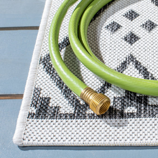 Safavieh Courtyard Elegant Geometric Pattern Area Rug For Modern Homes - Versatile Indoor/Outdoor Decor Ivory ,Black 88% Polypropylene,12% Polyester Cy8303-536-7r