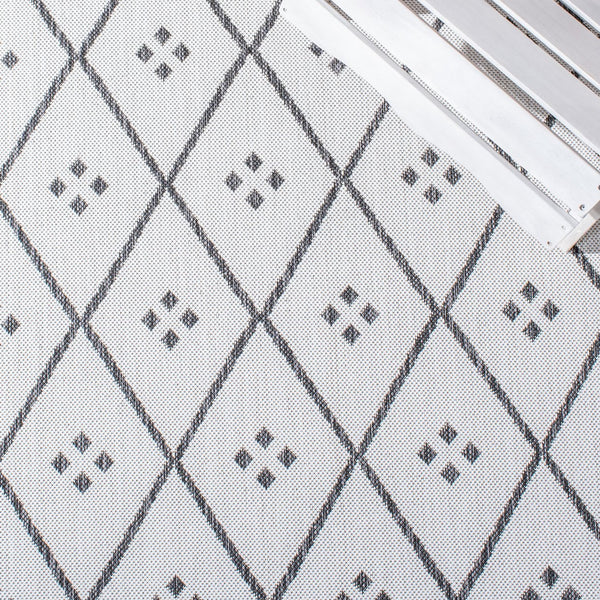 Safavieh Courtyard Elegant Geometric Pattern Area Rug For Modern Homes - Versatile Indoor/Outdoor Decor Ivory ,Black 88% Polypropylene,12% Polyester Cy8303-536-7r